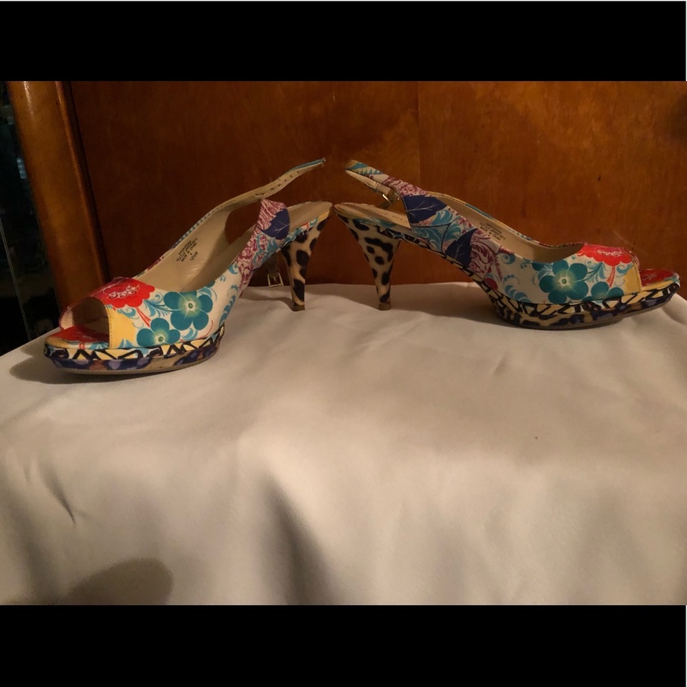 Multi colored animal print platform sling backs.